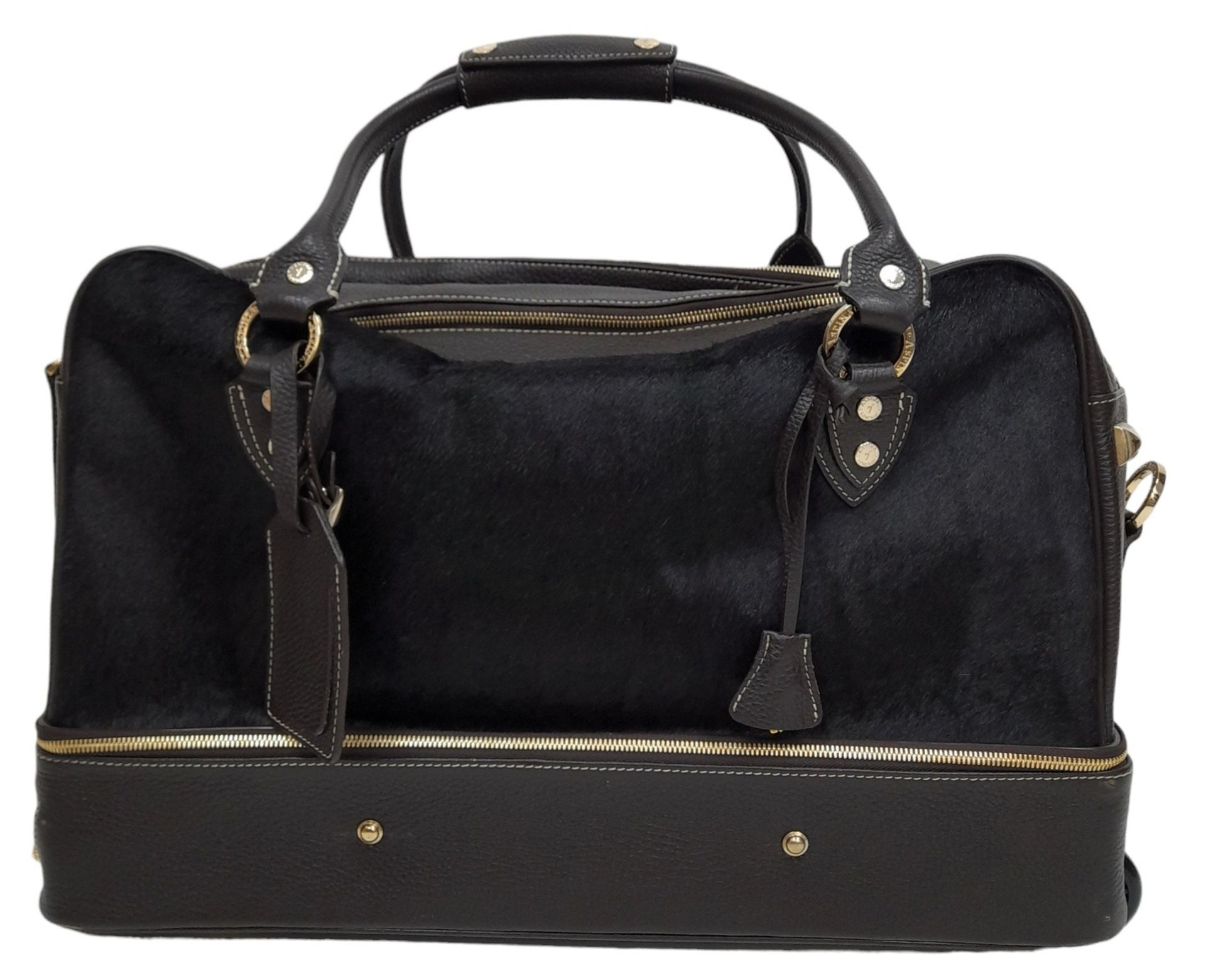 An Aspinal Brown Portofino Convertible Luggage Bag. Leather and pony fur exterior with gold-toned - Image 14 of 16