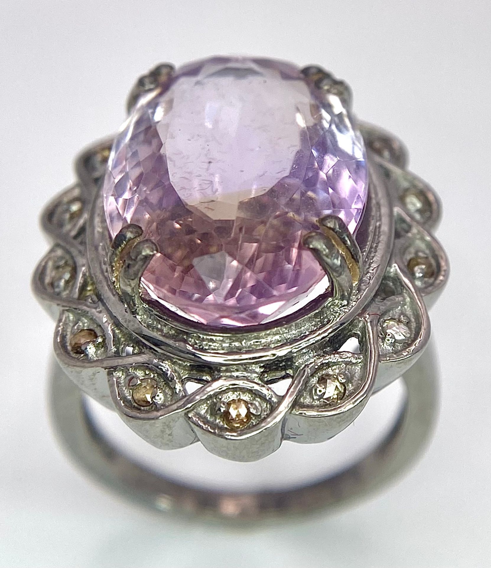 An 11.65ct Amethyst Ring with 0.25ctw of Diamond Accents. Set in 925 Silver. Size N. 9.4g total - Image 2 of 6