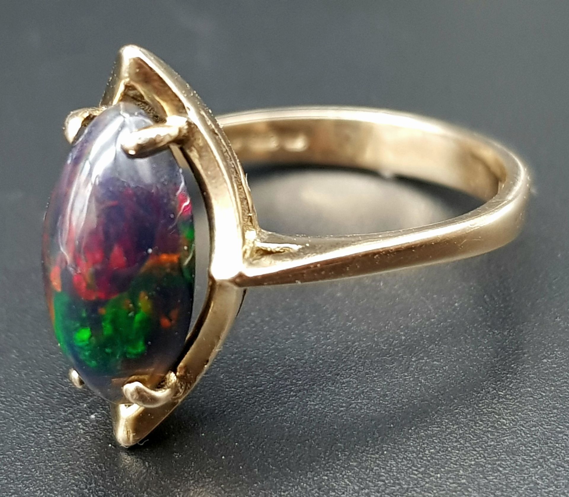 A Vintage 9K Yellow Gold Marquise Cut Opal Ring. Size O. 2.9g total weight. - Image 4 of 6