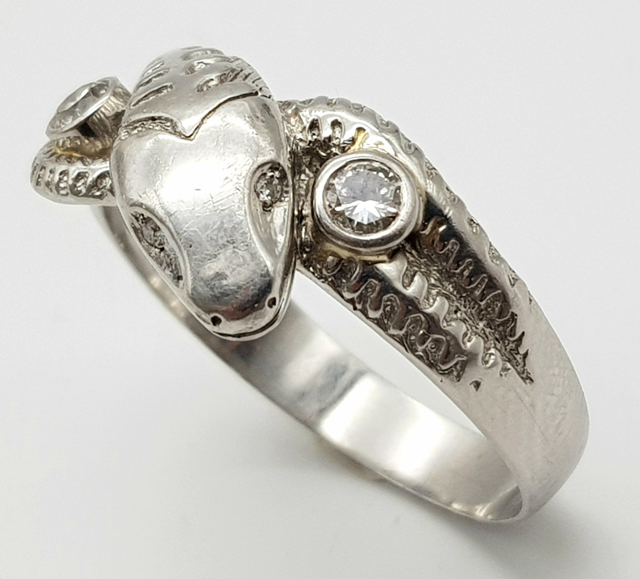A Very Large 950 Platinum and Diamond Snake Ring. A coiling serpent with diamond eyes and body. Size - Image 3 of 5