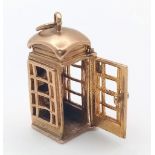 A 9K GOLD TELEPHONE BOX CHARM . 7.1gms