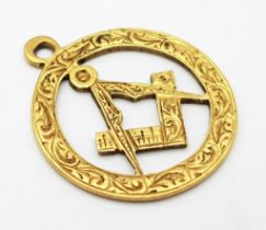 A Vintage 18K Yellow Gold Masonic Pendant. 2.5cm. 1.62g weight.