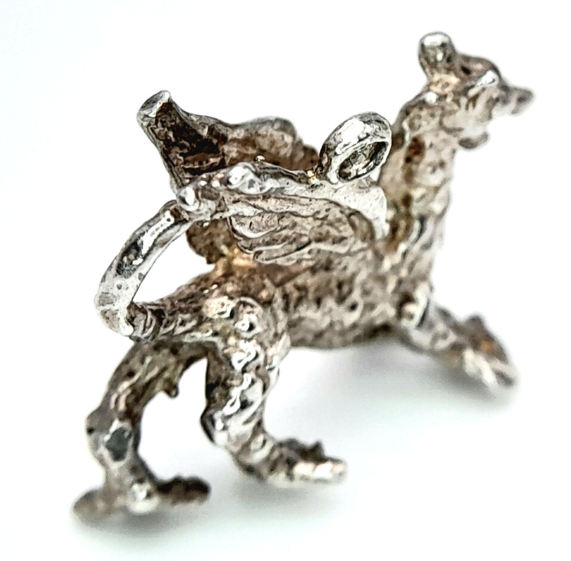 A STERLING SILVER WELSH DRAGON CHARM. 2.3cm x 1.6cm, 3.2g weight. Ref: SC 8106 - Image 2 of 5