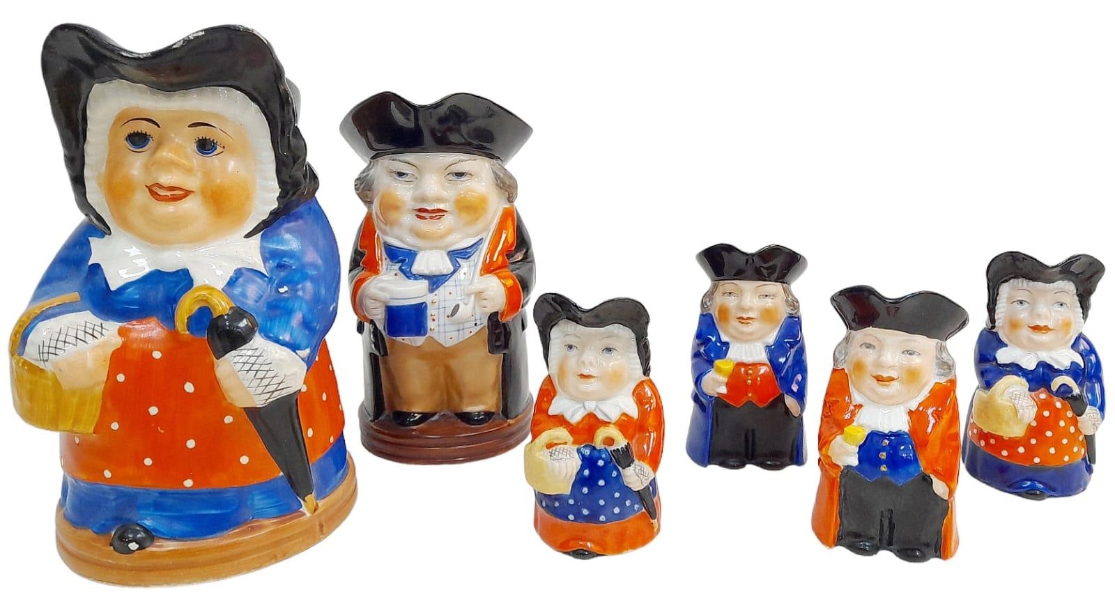 A COLLECTION OF UNUSUAL ROYAL WORCESTER TOBY JUGS HALF BEING FEMALE , 2 LARGE PLUS 4 SMALLER JUGS (