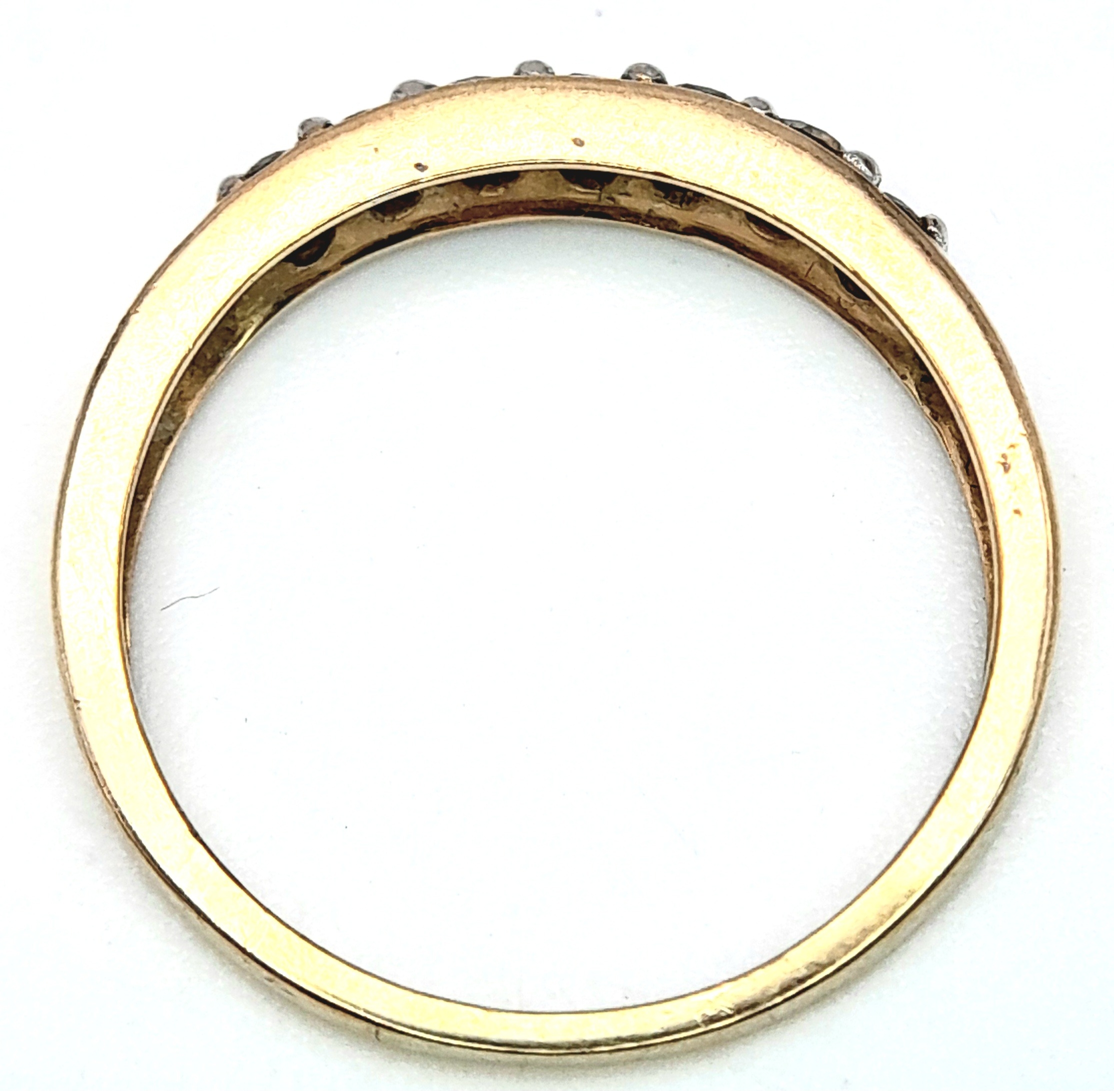 A 9K YELLOW GOLD DIAMOND SET BAND RING. 0.25ctw, Size N, 1.8g total weight. Ref: SC 8007 - Image 5 of 6