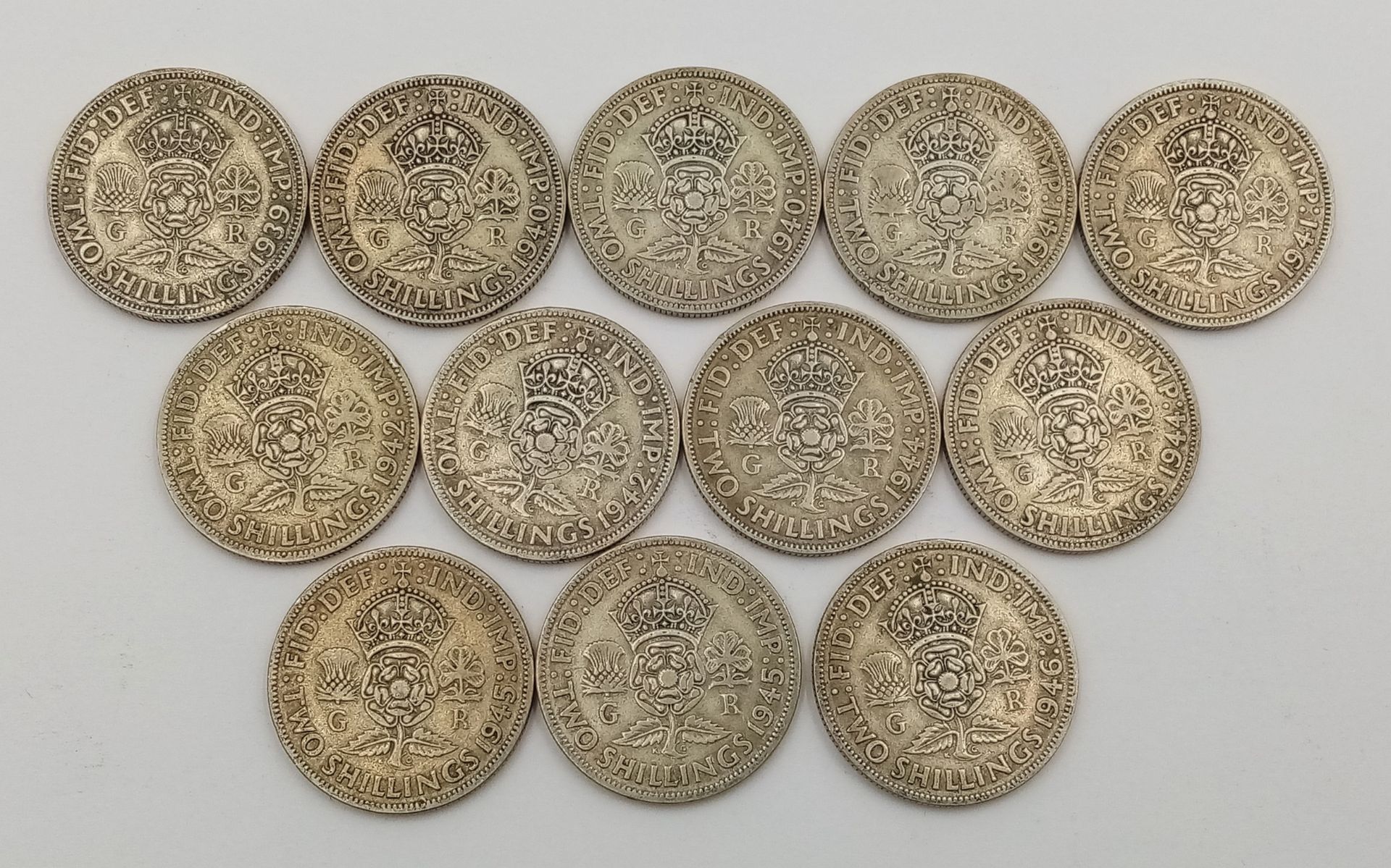 A Parcel of Twelve Pre-1947 Silver Two Shilling (Florin) Coins. Dates: 1 x 1939, 2 x 1940, 2 x 1941, - Image 2 of 2