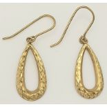 An attractive pair of 9 K yellow gold earrings, wonderfully catching the light from every direction,