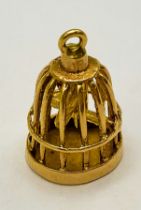 A 9K YELLOW GOLD PARROTT IN CAGE CHARM. 2.8cm length, 2.2g weight. Ref: SC 8018