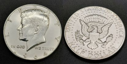 A 1964 Uncirculated Kennedy Silver Half Dollar.