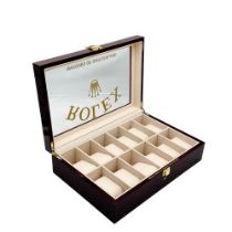 A 12 Watch Display Case - Perfect for Rolex Watches. Polished veneer exterior. Plush interior. 26