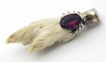 A Vintage Scottish Grouse Foot Brooch. Purple gemstone decoration. 8cm.