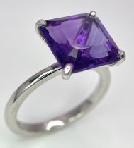 A 925 Silver and Amethyst Ring. Size K.