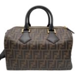 A Fendi Zucca Canvas Boston Bag. Canvas exterior, gold-tone hardware, adjustable strap, zipped top