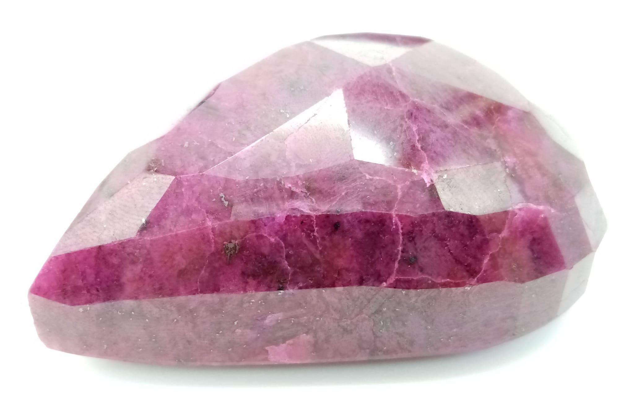 A Large Pear Shaped 800ct Red Corundum (Ruby) Gemstone. Colour enhanced. No certificate so as found. - Image 3 of 3