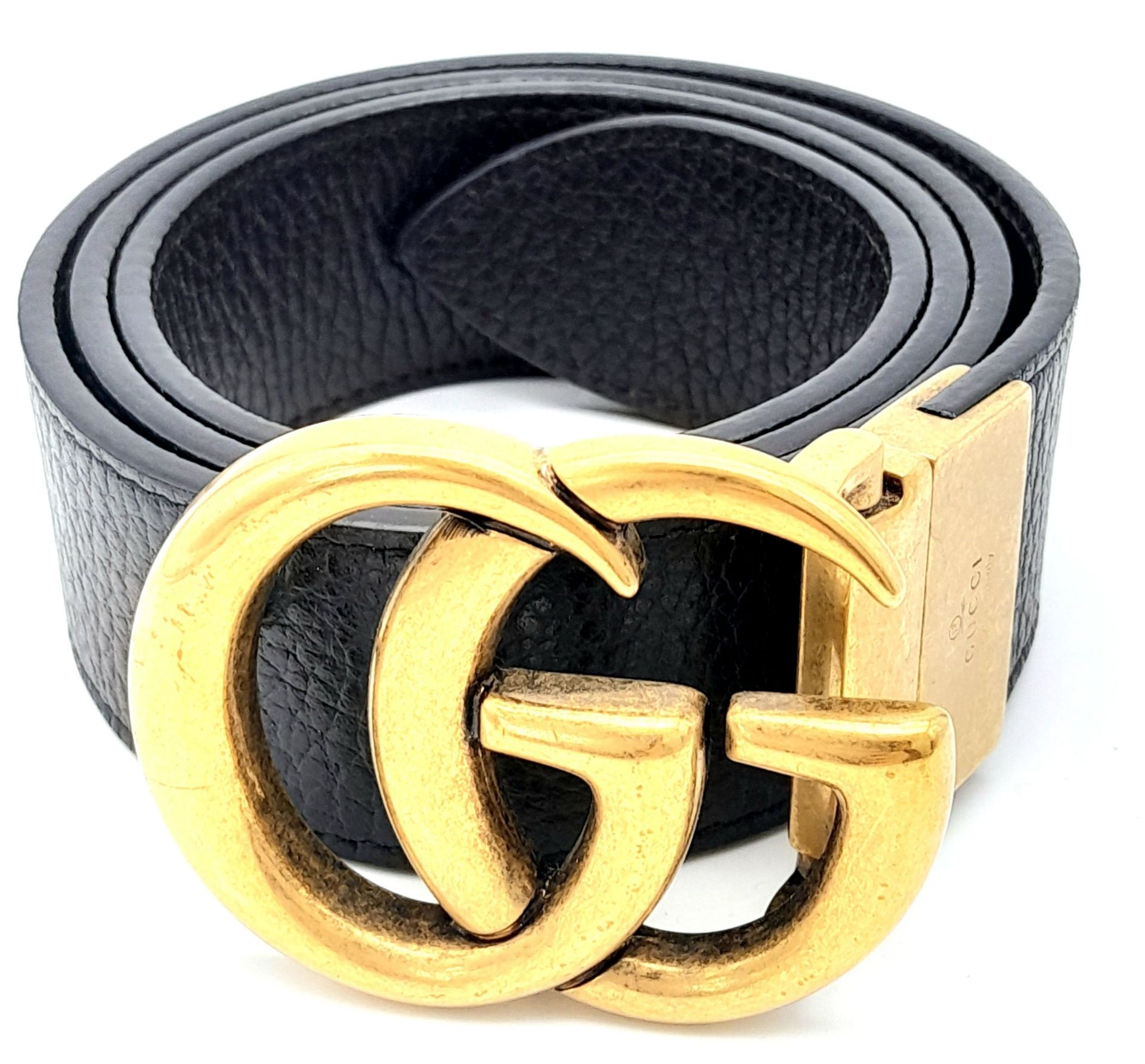 A Gucci Black Leather Belt. Classic gold tone Gucci monogram buckle. 94cm. Ref: 015222 - Image 2 of 7