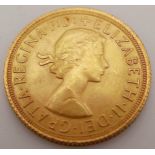 A 1964 22K Gold Queen Elizabeth II Full Sovereign Coin.