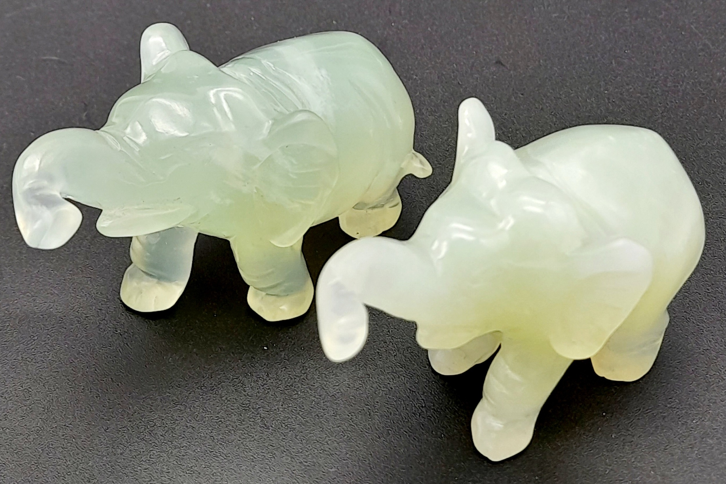 Two Green Jade Elephant Figures. 7cm x 4cm.