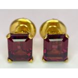 A Pair of 18K Yellow Gold and Alexandrite Earrings. Emerald cut alexandrite - 5ctw. 5.7g total