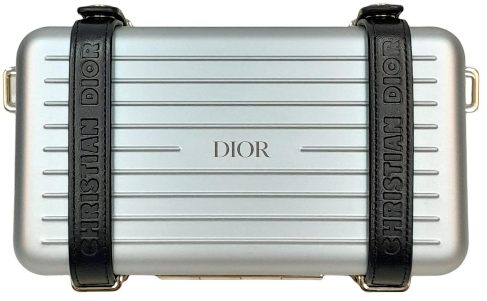 A Christian Dior x Rimowa Collaboration Ice Blue Clutch Bag. Aluminium exterior with silver-toned - Image 2 of 6