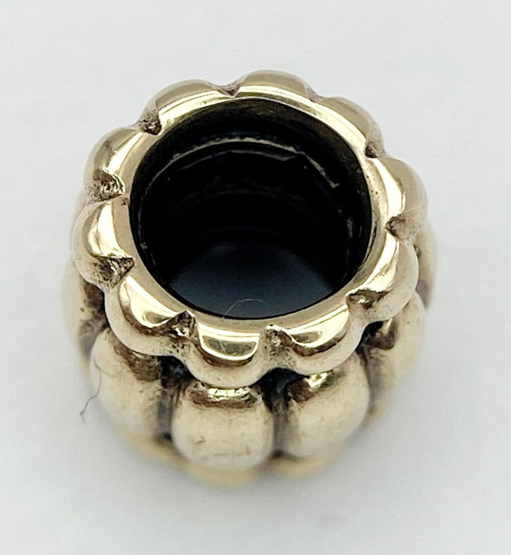 A 14K YELLOW GOLD PANDORA CHARM. 7mm length, 2.2g weight. Ref: SC 8134 - Image 2 of 5