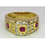 AN 18K YELLOW GOLD DIAMOND & RUBY RING. 0.60ctw, size K, 6.8g total weight. Ref: SC 8072