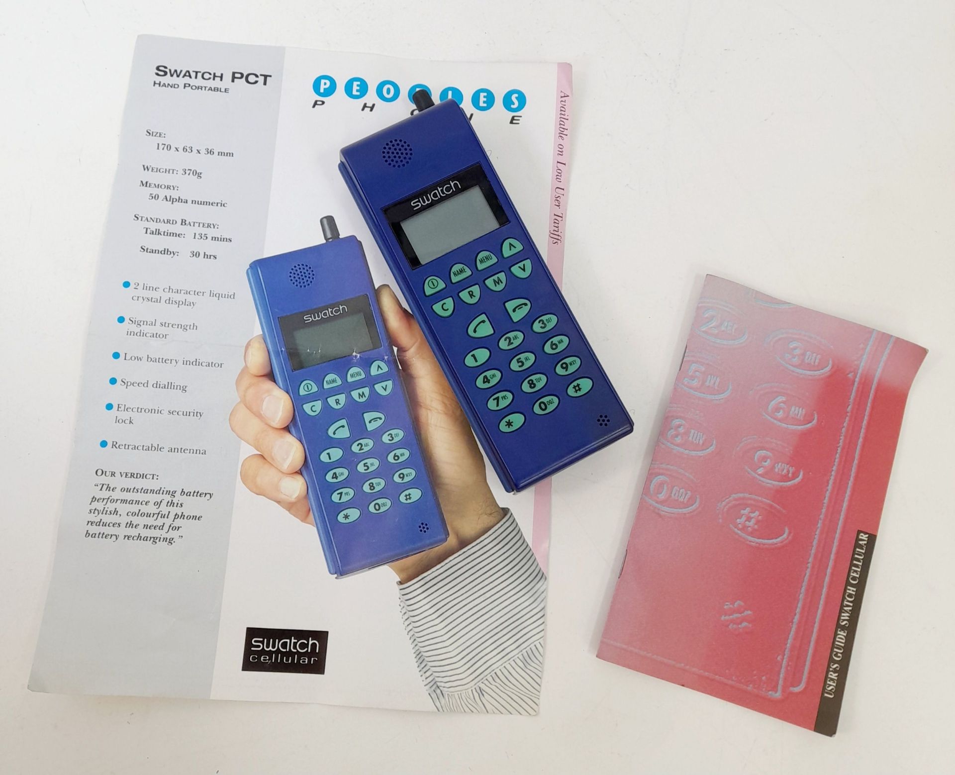 A Vintage Swatch PCT Large Blue Mobile Phone. Comes with paperwork.