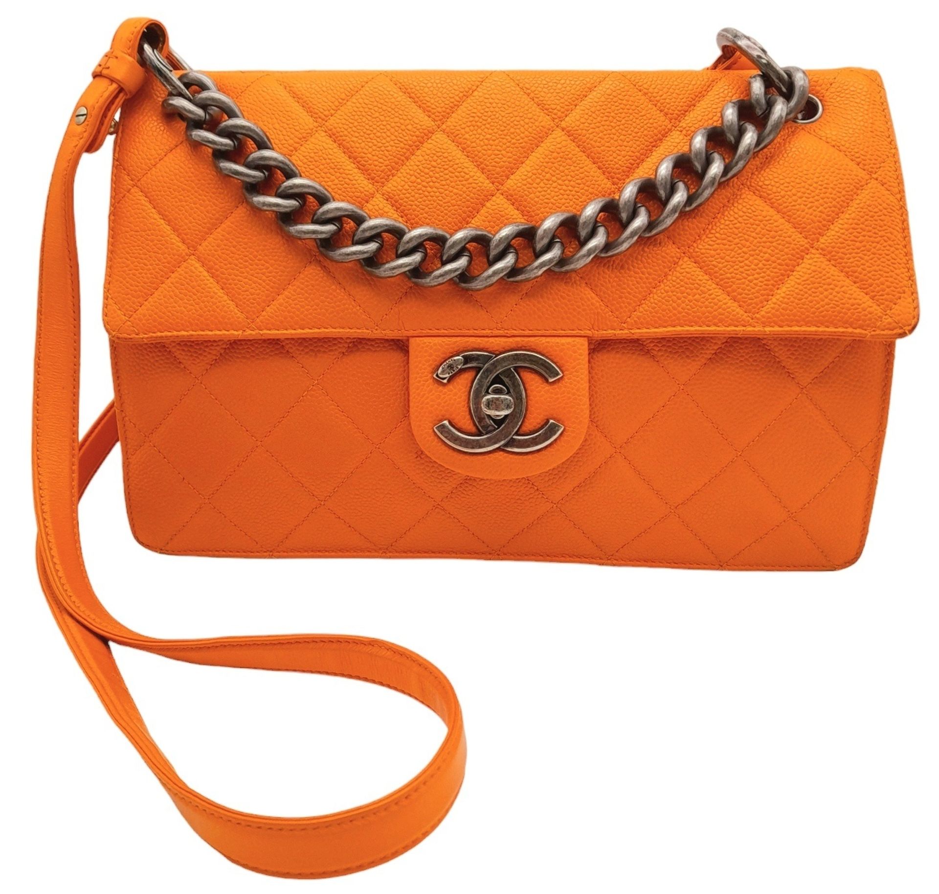 A Chanel Orange Quilted Caviar Leather Retro Shoulder Bag. Front flap with CC turn-lock and
