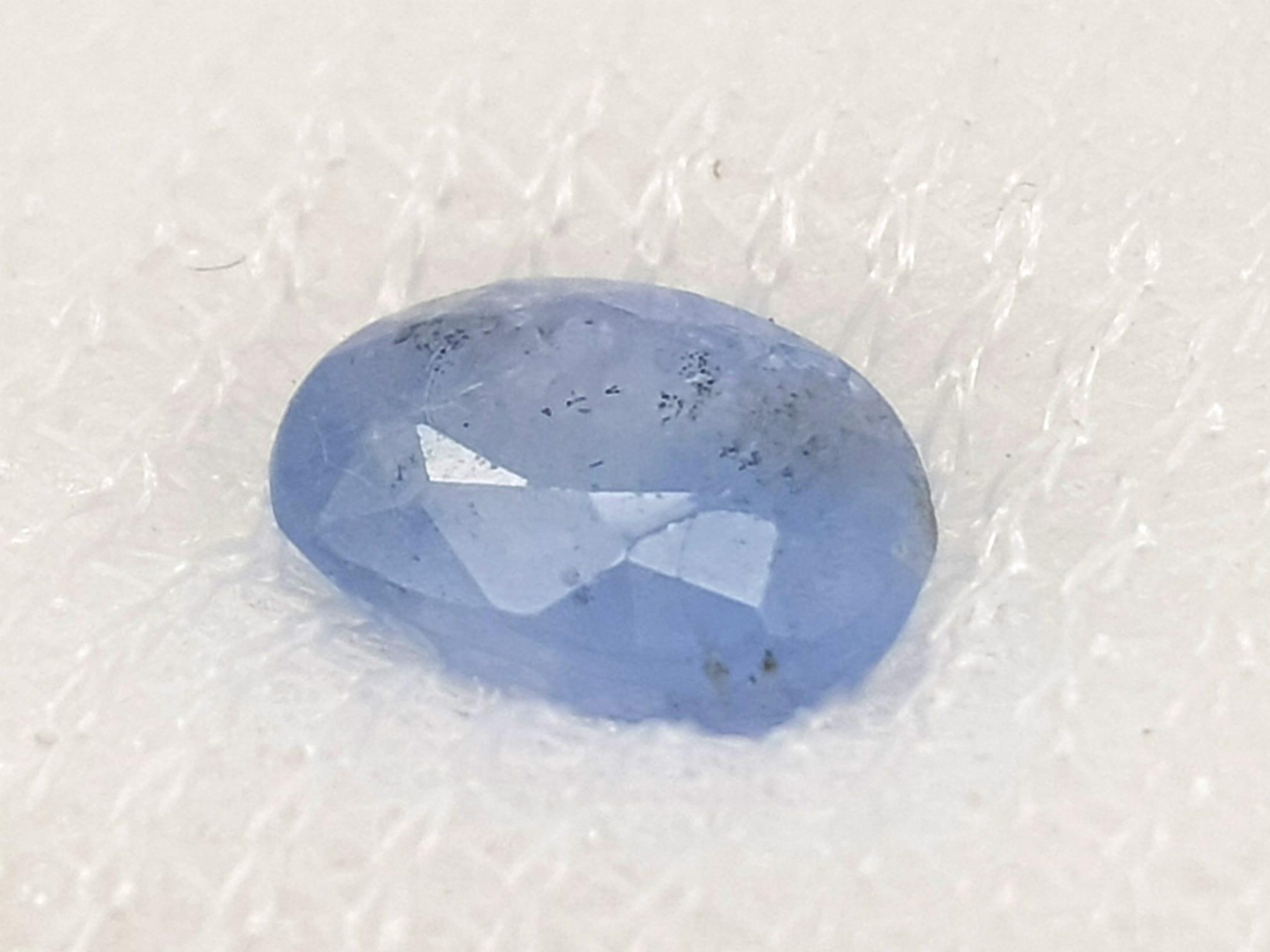 A 1.39ct Sri Lankan Blue Sapphire Gemstone - AIG Certified in a sealed case.