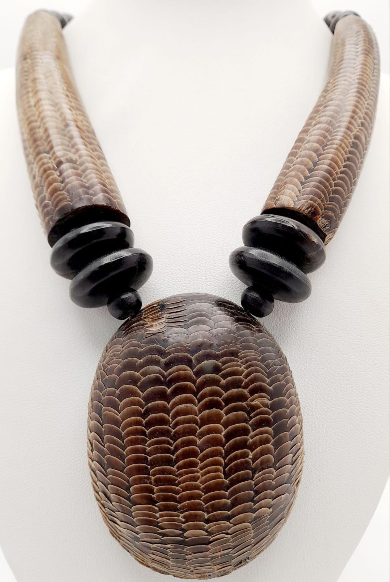 An East African talisman’s necklace, made with snakeskin and other materials, used by voodoo doctors