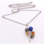 A Vintage and Unique Sterling Silver, Lapis Lazuli, Amber and Green Amber Pendant Necklace. 60cm