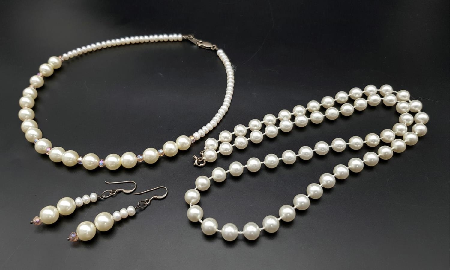 A Vintage Classic Rosita Faux Pearl Jewellery Set. Two necklace and a pair of drop earrings in the