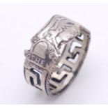 A STERLING SILVER RECYCLED SPOON HANDLE RING DESIGNED BY ADAM, ATHENS GLADIATOR THEME WITH GREEK