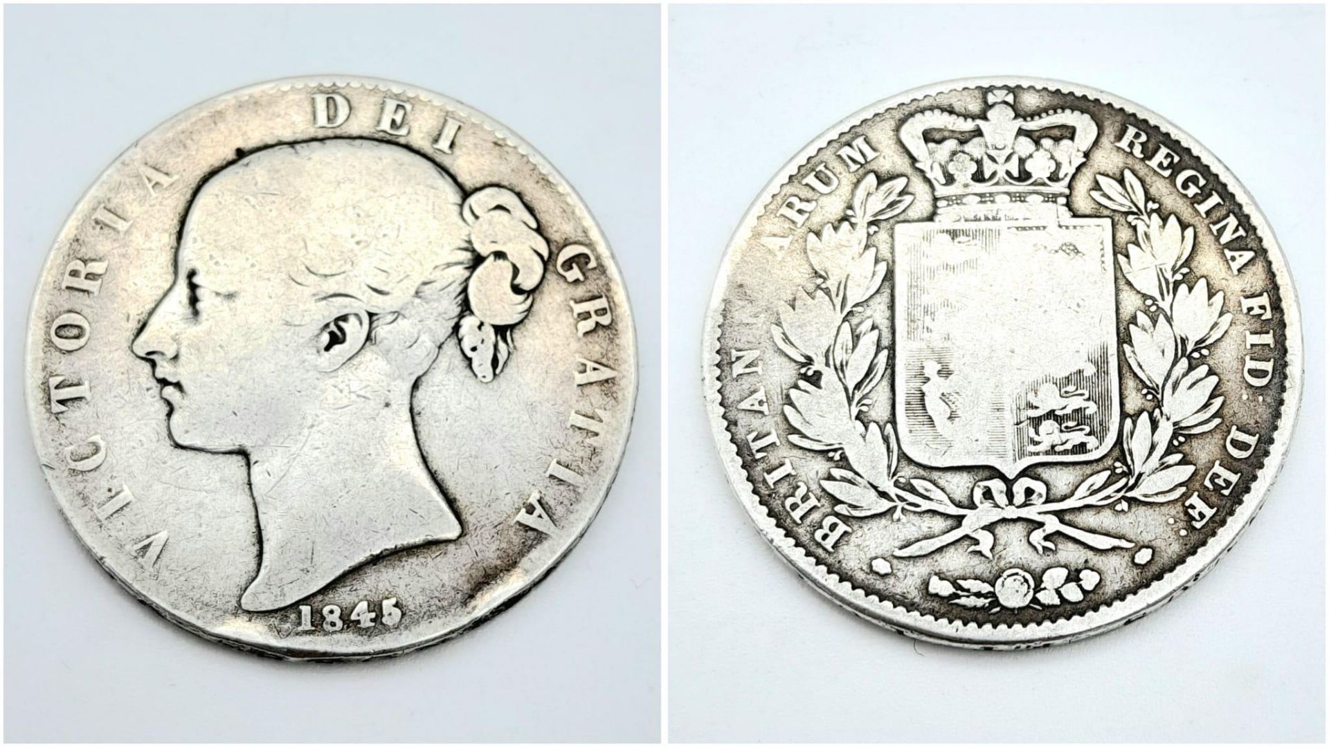 An 1845 Young Head Queen Victoria Silver Crown. F+ grade but please see photos.