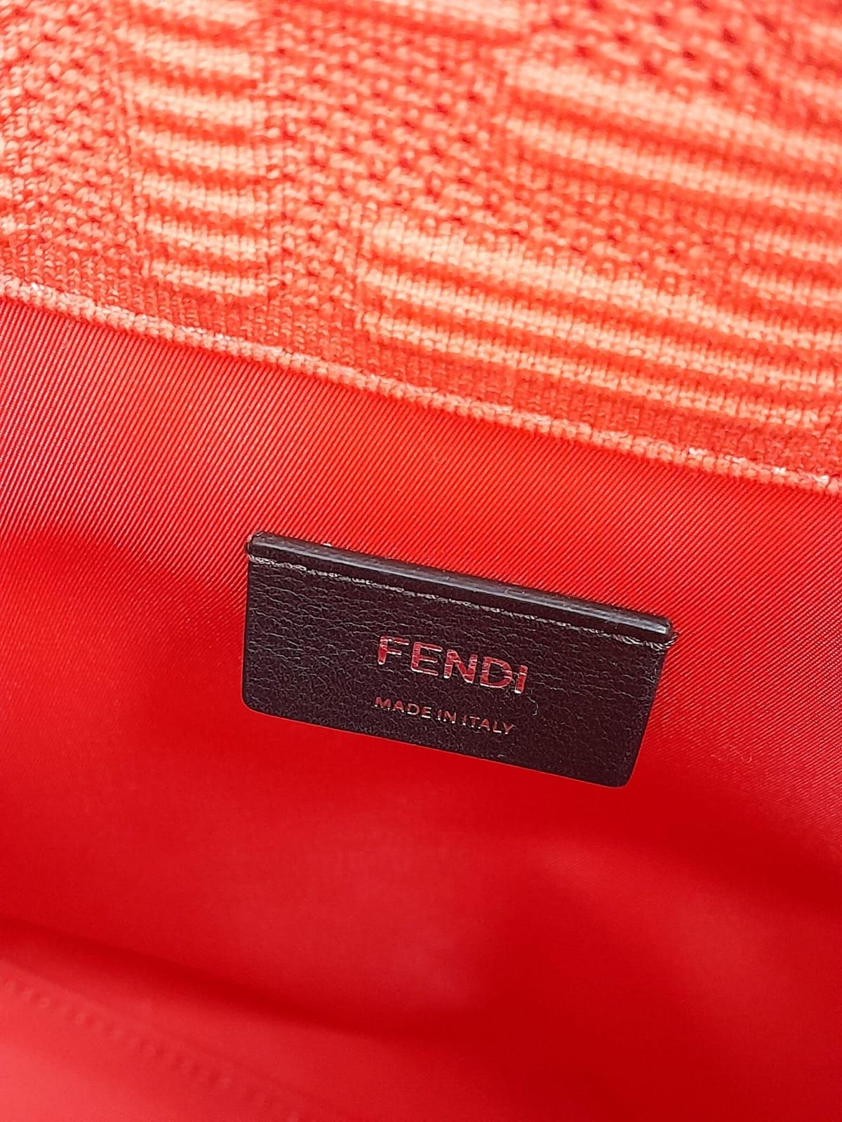 A Fendi Coral Sunshine Tote Bag. Textile exterior with leather trim, silver-toned hardware and two - Image 5 of 7