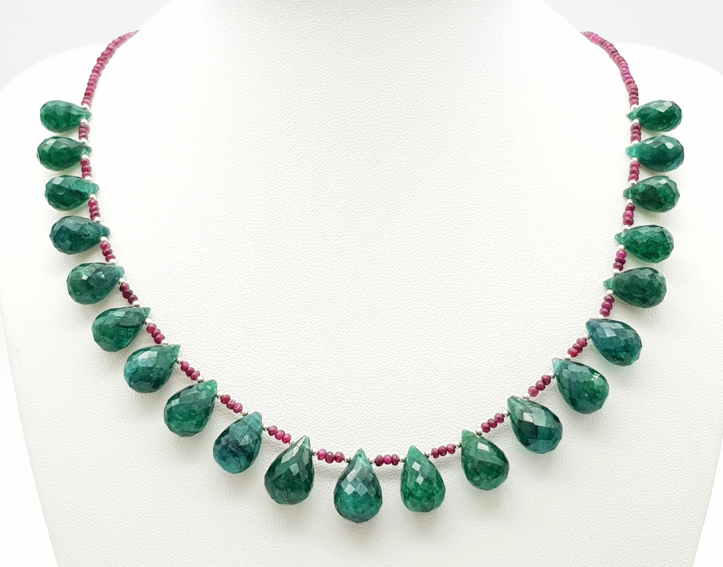 A 160ctw Emerald Teardrop Necklace with Ruby Spacer Beads And a Pair Matching Drop Earrings. 44cm - Image 2 of 5