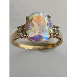 9 carat YELLOW GOLD and MAGIC TOPAZ RING. Having a large colour changing MAGIC TOPAZ mounted to top.