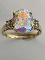 9 carat YELLOW GOLD and MAGIC TOPAZ RING. Having a large colour changing MAGIC TOPAZ mounted to top.