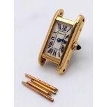 A Vintage 18K Gold Cartier Mini Tank Ladies Watch Case. 18k gold case with 2443 and other Cartier