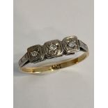 18 carat yellow GOLD RING set with 3 x DIAMONDS to top. 1.36 grams. Size L - L 1/2.