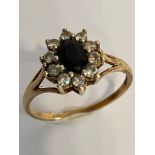 Attractive 9 carat GOLD DRESS RING, Having oval cut SPINEL to centre with clear ZIRCONIA surround.