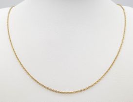 A 9K Yellow Gold Disappearing Necklace. 44cm length. 2.1g weight.