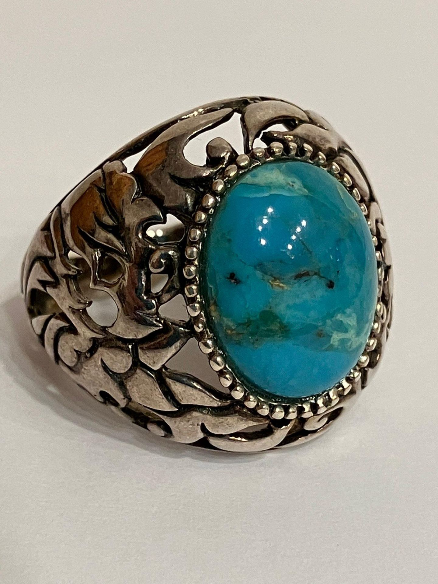 Vintage SILVER and TURQUOISE RING. Consisting a large Oval polished TURQUOISE set into a wide SILVER