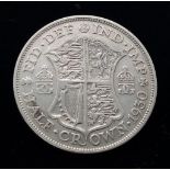 A George V 1930 Silver Half Crown Coin. VF grade but please see photos.