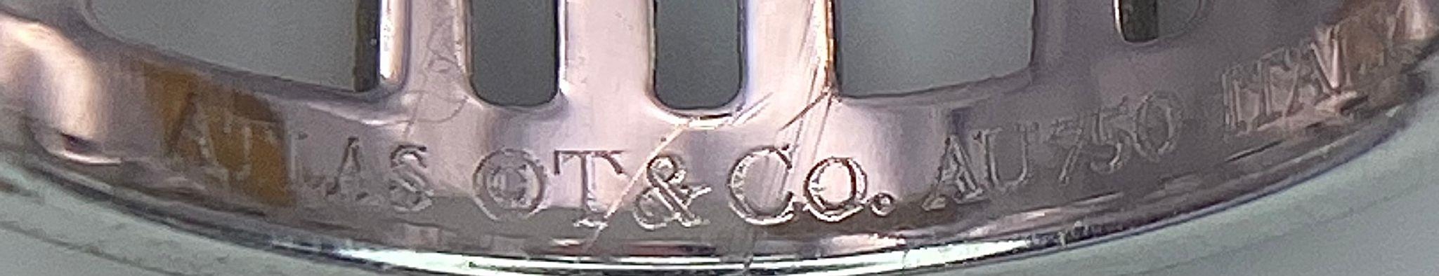 An 18K White Gold Tiffany Atlas Diamond Ring. Pierced Roman numeral decoration. Tiffany mark. Size - Image 9 of 9