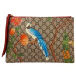 A Gucci Monogram 'Tian' Clutch Bag. Leather exterior with a depiction of a bird in nature, red