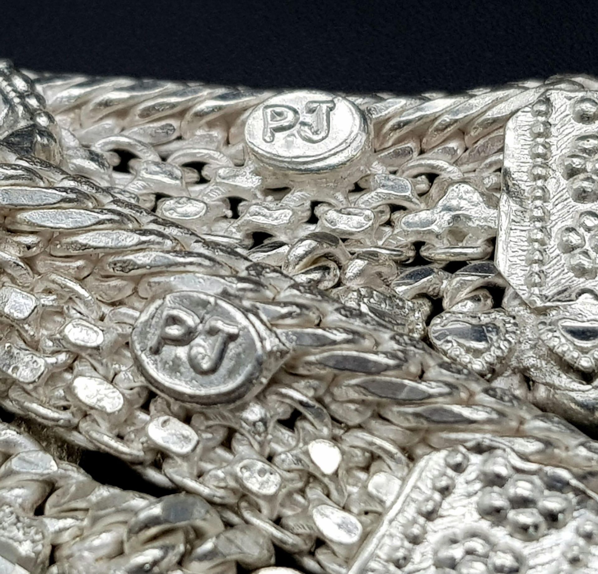 A Vintage Indian Silver (800) Jewellery Collection. Includes 4 upper arm decorative bands and one - Image 8 of 9