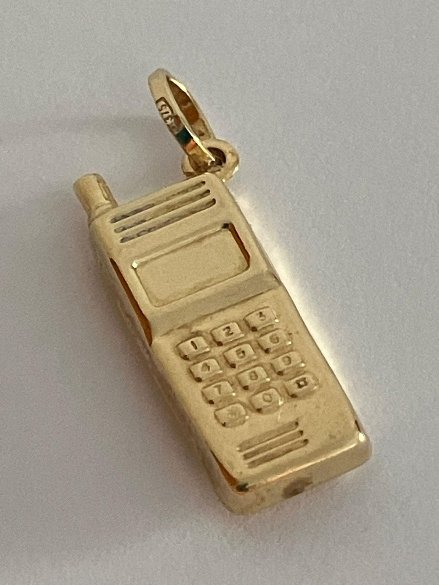 9 carat Yellow GOLD TELEPHONE CHARM. 0.9 grams.