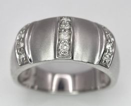 A 9K WHITE GOLD MATTE/POLISHED DIAMOND SET RING. 0.15ctw Size N, 6.2g total weight. Ref: SC 8001