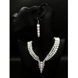 A magnificent necklace with three graduating rows of natural white mature pearls for the South Seas,
