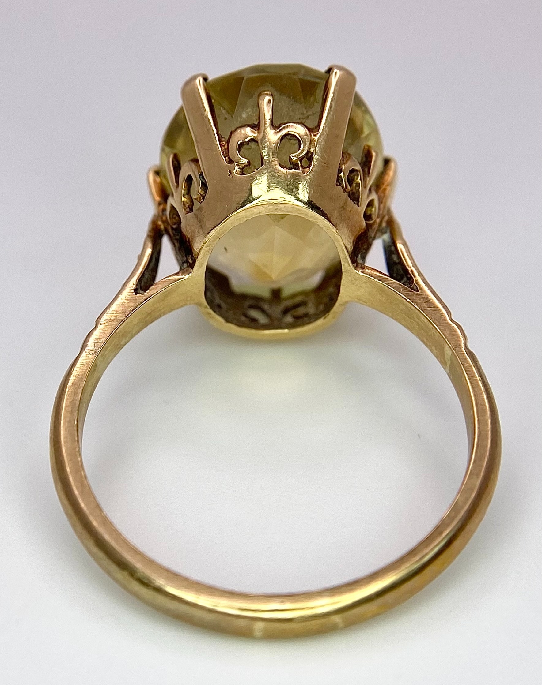 A Vintage 9K Yellow Gold Citrine Ring. 8ct oval cut citrine. Size Q. 5g total weight. - Image 6 of 6